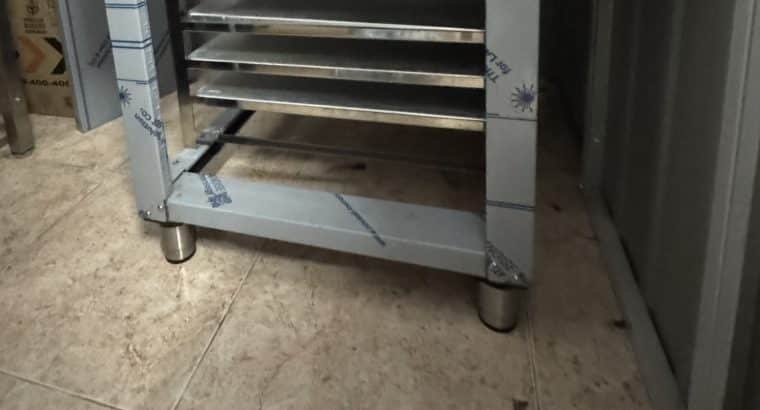 Soporte metálico con guías para horno